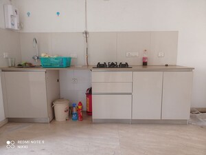 Kitchen in Studio Apartment at Hiranandani Estate Solitaire C, Ghodbunder Road – for Sale