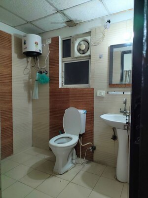 Bathroom in 3 BHK Apartment at Amrapali Silicon City, Sector 76 – for Rent