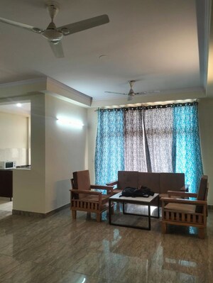 Living Room in 3 BHK Apartment at Amrapali Silicon City, Sector 76 – for Rent