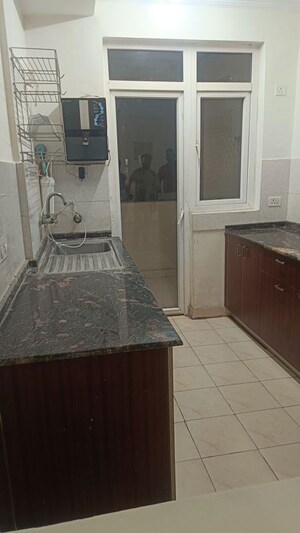 Kitchen in 3 BHK Apartment at Amrapali Silicon City, Sector 76 – for Rent