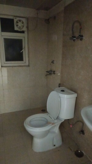 Bathroom in 3 BHK Apartment at Aims Golf City, Sector 75 – for Rent