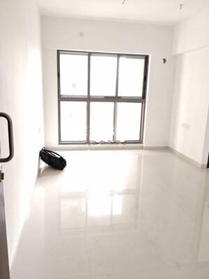 Room in 2 BHK Apartment at IM Applaud 38, Goregaon East – for Rent