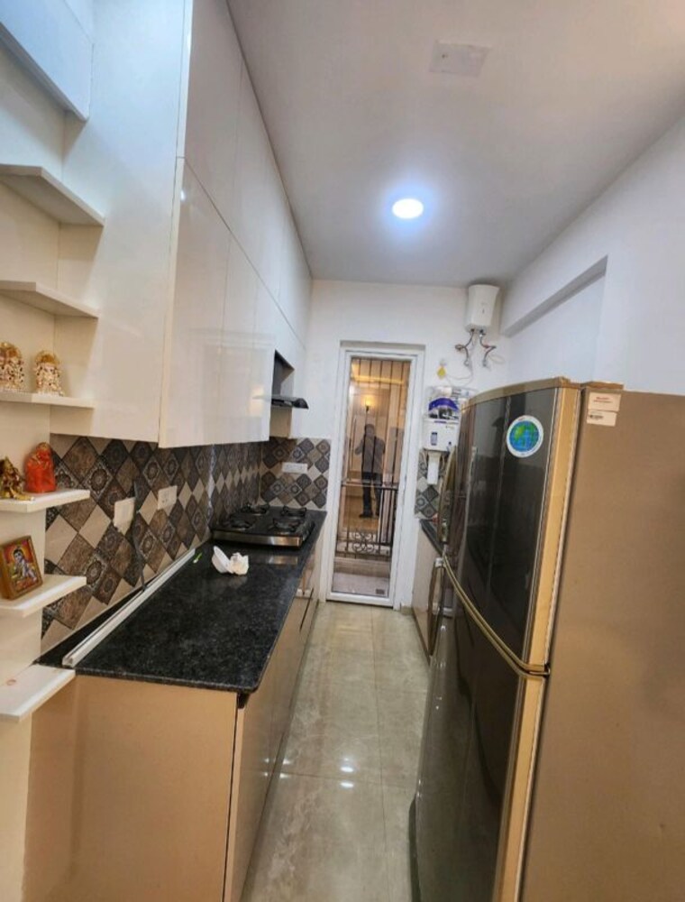 Kitchen, signature-global-park-4-and-5 3 Bedroom 1120 Sq.Ft. Builder Floor In Sohna Sector 36 Gurgaon 10386691