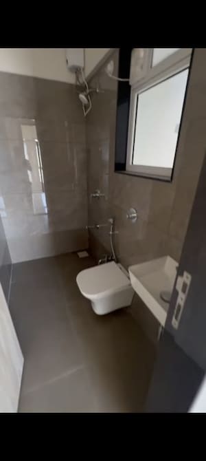 Bathroom in 1 BHK Apartment at Mahaveer Solitaire Edge, Kandivali East – for Rent