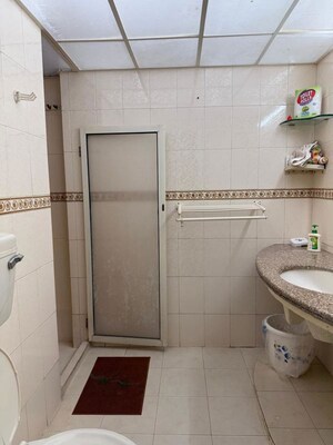 Bathroom in 2 BHK Apartment at Mount Unique, Peddar Road – for Rent