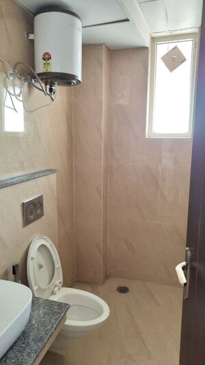 Bathroom in 3 BHK Apartment at Affinity Greens, International Airport Road – for Rent