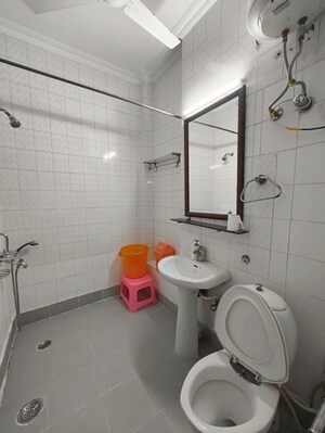 Bathroom in 3 BHK Builder Floor at Kalkaji – for Rent