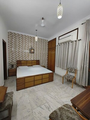 Bedroom in 3 BHK Builder Floor at Kalkaji – for Rent