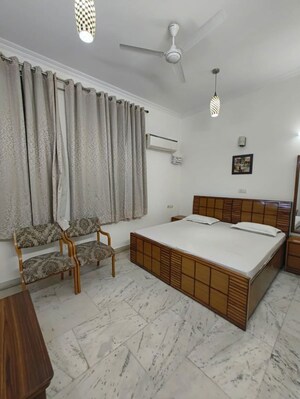 Bedroom in 3 BHK Builder Floor at Kalkaji – for Rent