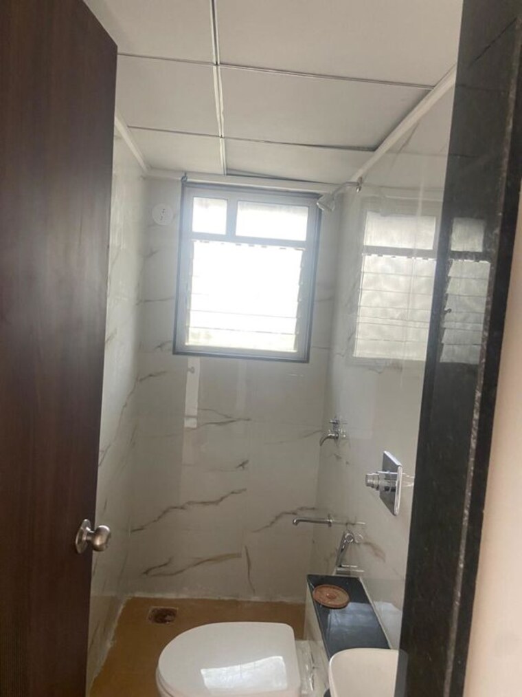 Bathroom, krisala-41-cosmo 3 Bedroom 1020 Sq.Ft. Apartment In Tathawade Pune 10387071