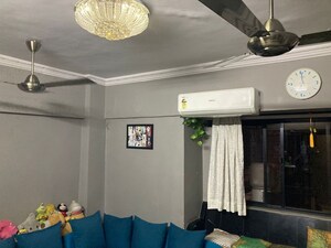 Living Room in 2 BHK Apartment at Olympic Towers, Andheri West – for Rent