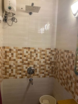 Bathroom in 2 BHK Apartment at Olympic Towers, Andheri West – for Rent