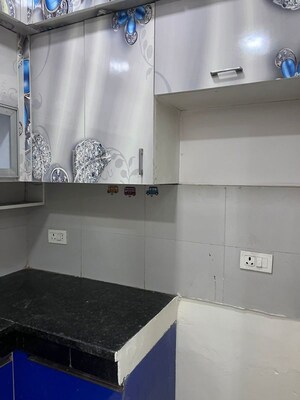 Kitchen in 3 BHK Apartment at Town Park White Orchid, Sector 16c Greater Noida – for Rent