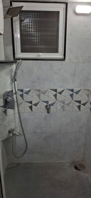 Bathroom in 1 BHK Apartment at Nagari Niwara CHS, Goregaon East – for Rent