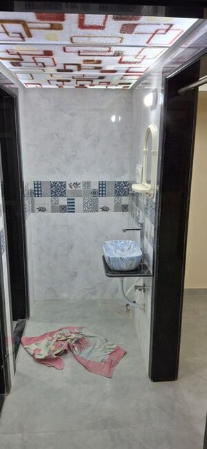 Bathroom in 1 BHK Apartment at Nagari Niwara CHS, Goregaon East – for Rent