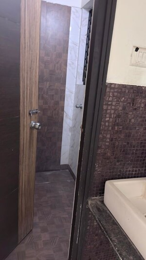 Bathroom in 1 BHK Apartment at Tharwani Vedant Millenia, Titwala – for Sale