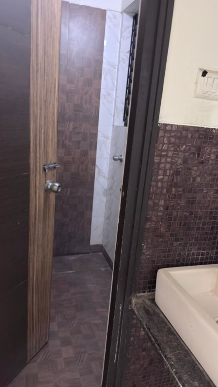 Bathroom, tharwani-vedant-millenia 1 Bedroom 650 Sq.Ft. Apartment In Titwala Thane 10387231