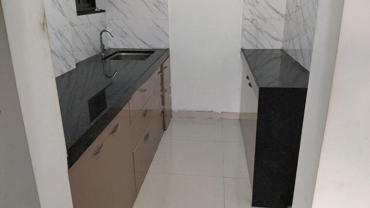 Kitchen, uk-iridium 2 Bedroom 860 Sq.Ft. Apartment In Kandivali East Mumbai 10387323
