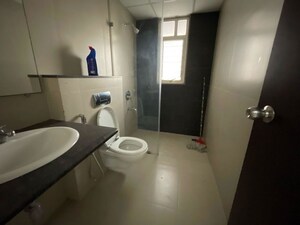 Bathroom in 3 BHK Apartment at Kolte Patil Tuscan Parkland, Kharadi – for Rent