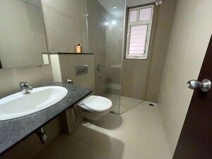 Bathroom in 3 BHK Apartment at Kolte Patil Tuscan Parkland, Kharadi – for Rent