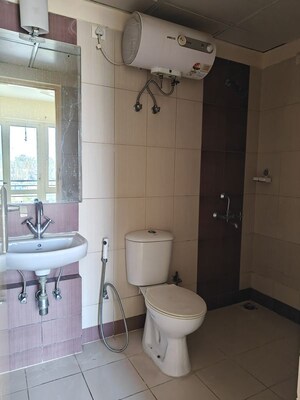 Bathroom in 3 BHK Apartment at Mahindra Aura, Sector 110a – for Sale