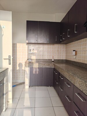 Kitchen in 3 BHK Apartment at Mahindra Aura, Sector 110a – for Sale