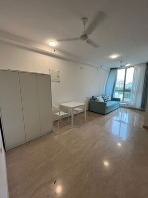 Living Room in Studio Apartment at Hiranandani Estate Solitaire C, Ghodbunder Road – for Rent