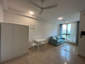 Living Room in Studio Apartment at Hiranandani Estate Solitaire C, Ghodbunder Road – for Rent