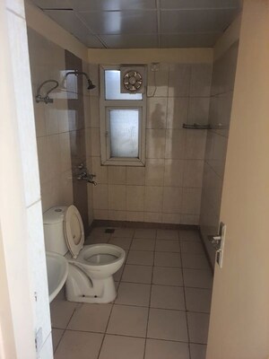Bathroom in 3 BHK Apartment at Mahindra Aura, Sector 110a – for Rent