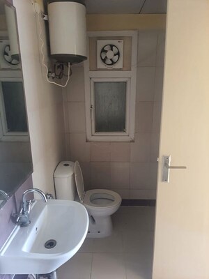 Bathroom in 3 BHK Apartment at Mahindra Aura, Sector 110a – for Rent