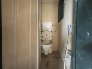 Bathroom in 1 BHK Apartment at Puranik City, Kasarvadavali – for Sale