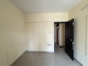 Room in 2 BHK Apartment at Harmony Horizons, Ghodbunder Road – for Sale