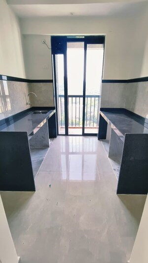 Kitchen in 2 BHK Apartment at Damji Shamji Mahavir Spring Tulip Phase 1, Pokhran Road No Two – for Rent