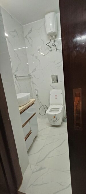 Bathroom in 4 BHK Apartment at Vasant Kunj – for Rent