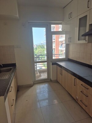 Kitchen in 3.5 BHK Apartment at Mahindra Aura, Sector 110a – for Rent