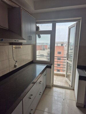 Kitchen in 3.5 BHK Apartment at Mahindra Aura, Sector 110a – for Rent