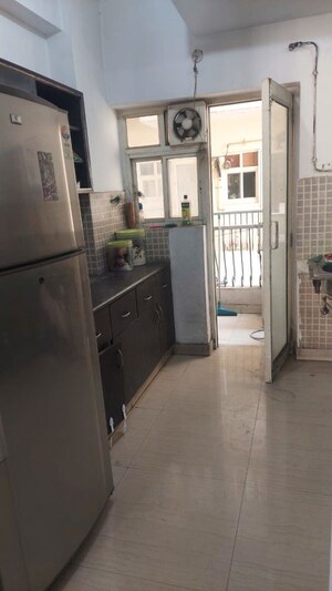 Kitchen in 3 BHK Apartment at Amrapali Silicon City, Sector 76 – for Rent