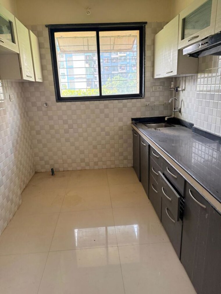 Kitchen, umiya-uma-paradise-complex 2 Bedroom 950 Sq.Ft. Apartment In Titwala Thane 10387821
