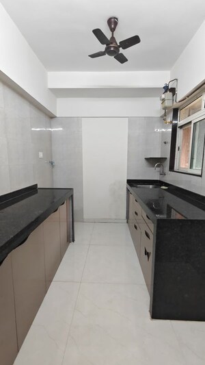 Kitchen in 2 BHK Apartment at JPV Pratap Cress, Malad West – for Sale
