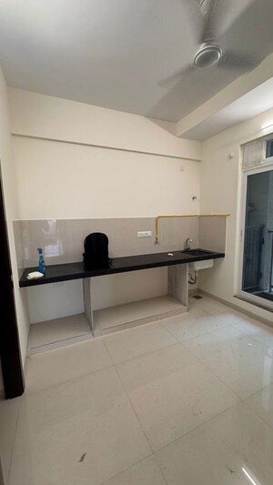 Kitchen in 2 BHK Apartment at Piramal  Vaikunth Cluster 4, Balkum Pada – for Rent
