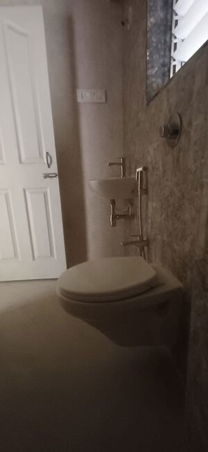 Bathroom in 2 BHK Apartment at Yash Veer Galaxy, Naupada – for Sale