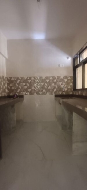 Kitchen in 2 BHK Apartment at Yash Veer Galaxy, Naupada – for Sale