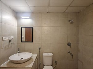 Bathroom in 1.5 BHK Apartment at Bhartiya City Nikoo Homes II, Thanisandra Main Road – for Sale