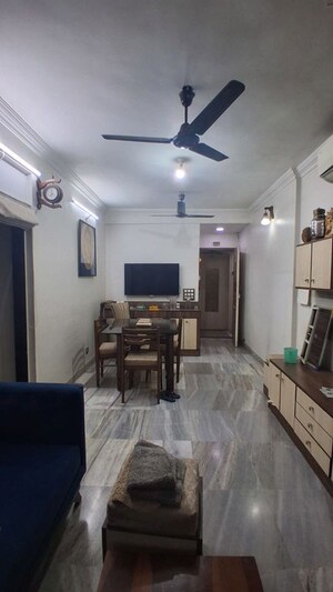 Living Room in 2 BHK Apartment at Raheja Township, Malad East – for Rent