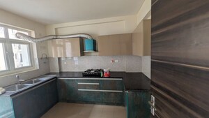 Kitchen in 4 BHK Apartment at Orris Aster Court Premier, Sector 85 – for Rent