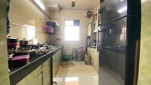 Kitchen in 2 BHK Apartment at Gokul Nagari CHS, Dombivli East – for Sale
