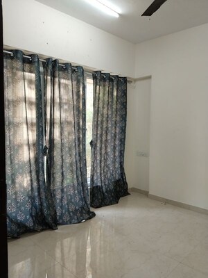 Bedroom in 1 BHK Apartment at Ruparel Elara Mumbai, Kandivali West – for Rent