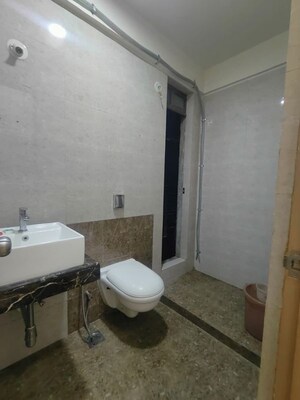 Bathroom in 2 BHK Apartment at Raj Infinia, Malad West – for Rent
