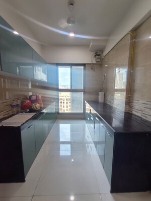 Kitchen in 2 BHK Apartment at Raj Infinia, Malad West – for Rent
