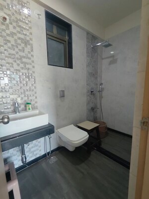 Bathroom in 2 BHK Apartment at Raj Infinia, Malad West – for Rent